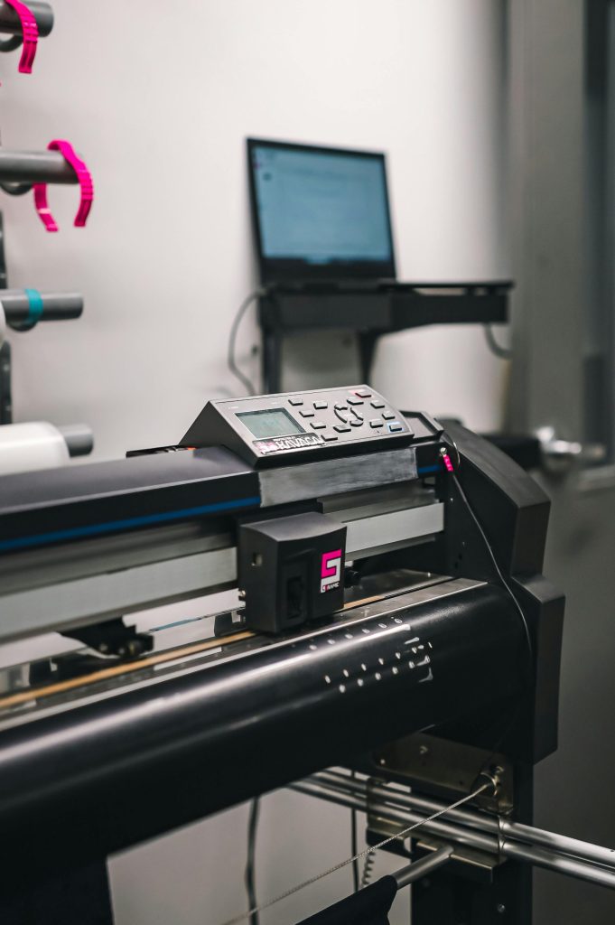 Close-up of modern printing machine in a professional studio environment.